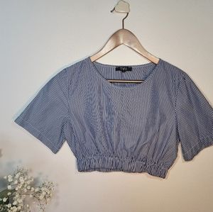 𝅺tyli crop top. Stripped blue and white. Cinched waistline. M